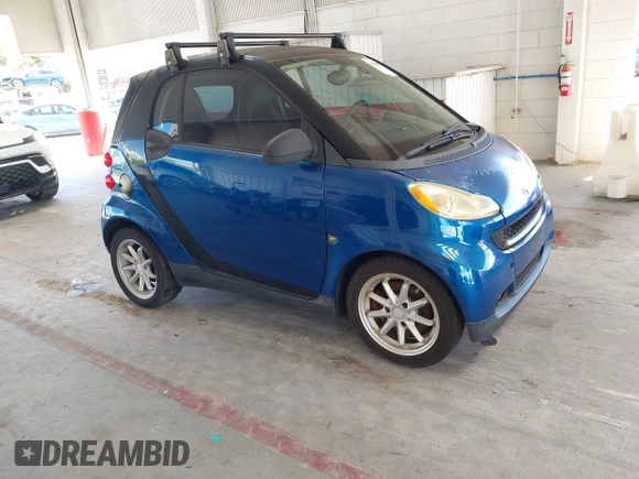2008 Smart fortwo Pure with VIN WMEEJ31X28K123879, listed as a IAAI auction lot 42258663 with 93,056 mi miles and . Bid and sale history available at DreamBid. Image 1.
