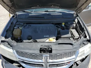 2012 Dodge Journey SXT z VIN 3C4PDDBG0CT345864, wystawiony jako Copart lot #55453875 z przebiegiem 142 444 mil mil oraz Szkoda całkowita • Salvage title. Historia ofert i sprzedaży dostępna na DreamBid. Obrazek 12.