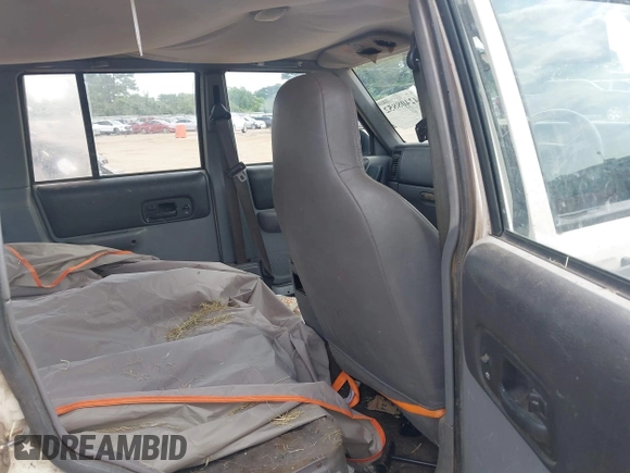 1998 Jeep Cherokee with VIN 1J4FB28S7WL209453, listed as a IAAI auction lot 42408852 with Not provided miles and . Bid and sale history available at DreamBid. Image 8.