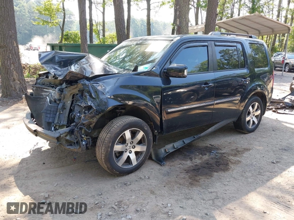 2013 Honda Pilot Touring with VIN 5FNYF3H96DB011470, listed as a IAAI auction lot 42535022 with 201,380 mi miles and . Bid and sale history available at DreamBid. Image 2.