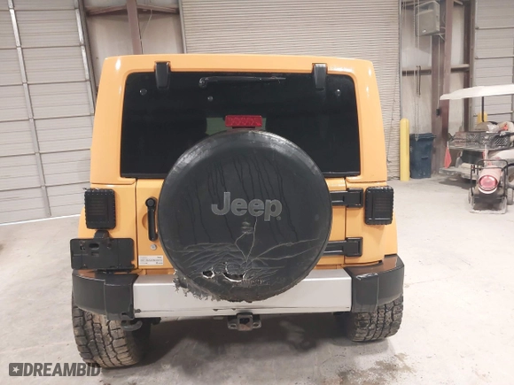 2012 Jeep Wrangler Unlimited Sahara with VIN 1C4HJWEG0CL173304, listed as a IAAI auction lot 41853457 with 278,324 mi miles. Bid and sale history available at carsss.com. Image 16.