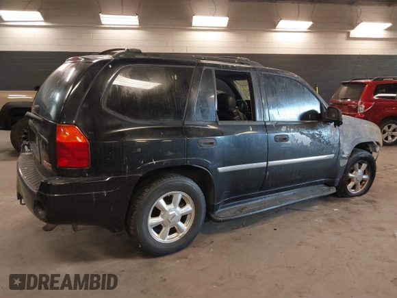 2007 GMC Envoy SLE with VIN 1GKDT13S872298442, listed as a IAAI auction lot 41343565 with 106,818 mi miles. Bid and sale history available at carsss.com. Image 4.