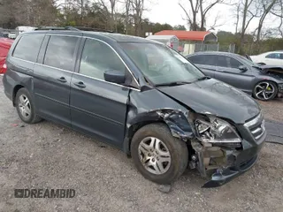 2005 Honda Odyssey EX-L with VIN 5FNRL38705B091698, listed as a IAAI auction lot 41708131 with 260,513 mi miles. Bid and sale history available at carsss.com. Image 1.
