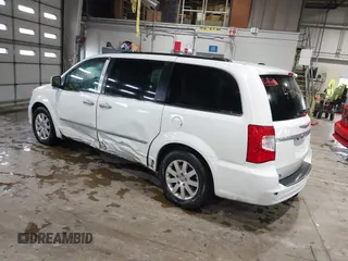 2015 Chrysler Town & Country Touring with VIN 2C4RC1BG0FR628721, listed as a IAAI auction lot 41101486 with 125,942 mi miles. Bid and sale history available at carsss.com. Image 3.
