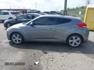 2013 Hyundai Veloster w/Black Int with VIN KMHTC6AD6DU169765, listed as a IAAI auction lot 41928516 with 130,708 mi miles and . Bid and sale history available at DreamBid. Image 14.