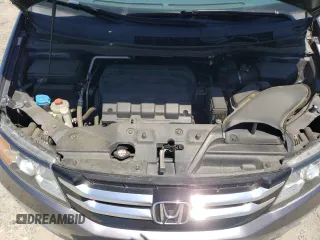 2014 Honda Odyssey Touring с VIN 5FNRL5H92EB116923, выставлен на аукционе Copart как лот 58060645 с пробегом 106 285 миль миль и Списание • Salvage title. История ставок и продаж доступна на DreamBid. Изображение 12.