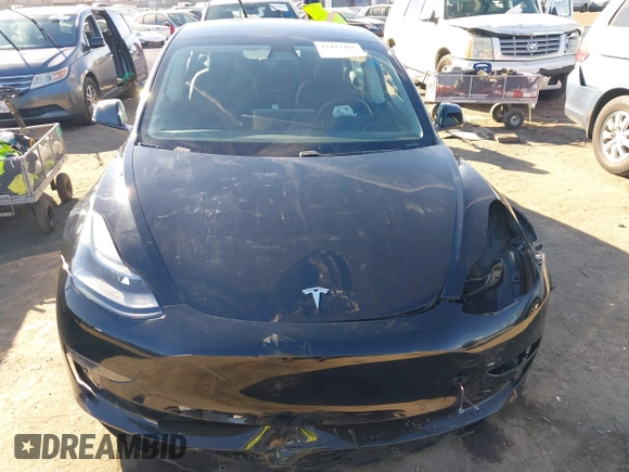 2021 Tesla Model 3 Performance with VIN 5YJ3E1EC6MF999321, listed as a IAAI auction lot 41417451 with 20,562 mi miles and . Bid and sale history available at carsss.com. Image 12.
