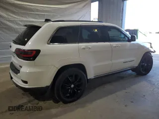 2015 Jeep Grand Cherokee Summit with VIN 1C4RJFJG1FC226591, listed as a Copart auction lot 52926115 with 130,803 mi miles and Salvage Title. Bid and sale history available at DreamBid. Image 3.