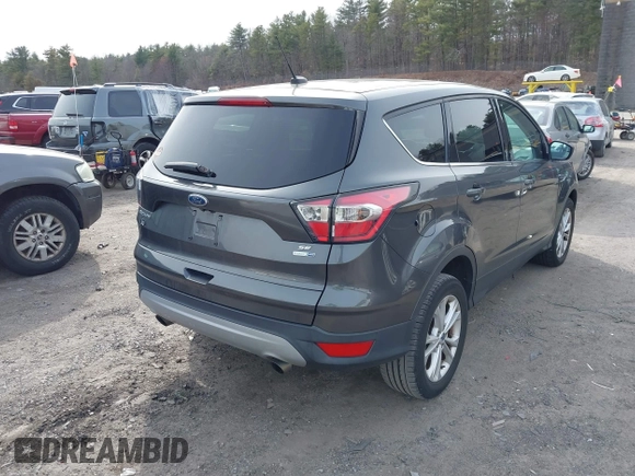 2017 Ford Escape SE with VIN 1FMCU9G90HUA32991, listed as a IAAI auction lot 41947411 with 118,654 mi miles. Bid and sale history available at carsss.com. Image 4.