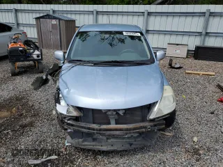 2011 Nissan Versa S with VIN 3N1BC1CP0BL439383, listed as a Copart auction lot 50328905 with 126,850 mi miles and Salvage title. Bid and sale history available at DreamBid. Image 5.