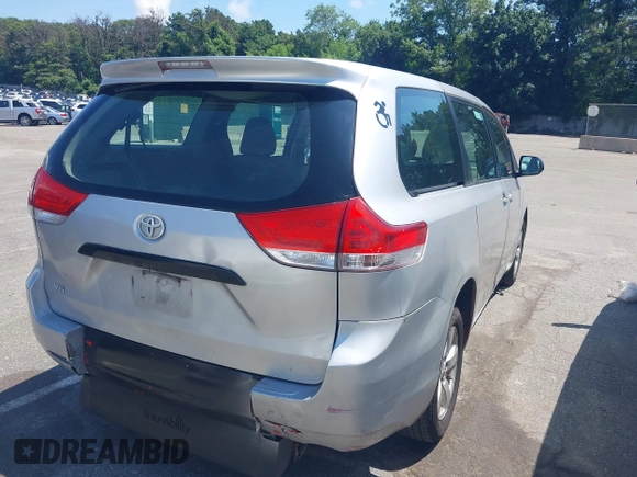2014 Toyota Sienna L with VIN 5TDZK3DC9ES518653, listed as a IAAI auction lot 42767591 with 261,730 mi miles and . Bid and sale history available at DreamBid. Image 4.