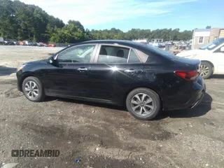 2023 Kia Rio S with VIN 3KPA24AD5PE531705, listed as a IAAI auction lot 39817112 with 73,997 mi miles. Bid and sale history available at carsss.com. Image 14.