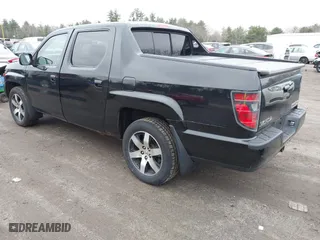 2014 Honda Ridgeline SE with VIN 5FPYK1F66EB005881, listed as a IAAI auction lot 41977349 with 184,567 mi miles. Bid and sale history available at carsss.com. Image 3.
