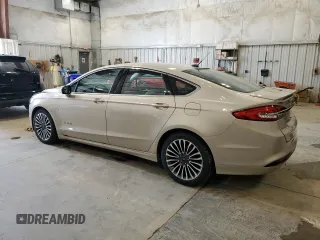2017 Ford Fusion Hybrid Titanium with VIN 3FA6P0RU3HR360053, listed as a Copart auction lot 63063715 with 127,534 mi miles and Non repairable. Bid and sale history available at DreamBid. Image 2.
