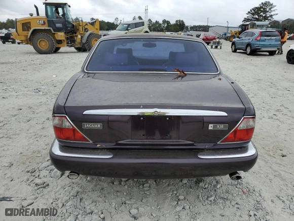 1998 Jaguar XJ with VIN SAJHX1240WC822861, listed as a Copart auction lot 79388654 with 120,568 mi miles and Non Repairable. Bid and sale history available at carsss.com. Image 6.