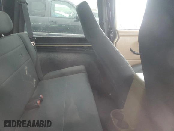 2001 Jeep Wrangler Sport с VIN 1J4FA49S71P312113, выставлен на аукционе Copart как лот 51168125 с пробегом 120 683 миль миль и Списание • Salvage title. История ставок и продаж доступна на DreamBid. Изображение 10.