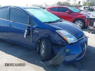 2009 Toyota Prius with VIN JTDKB20U297856633, listed as a IAAI auction lot 42013442 with 247,448 mi miles. Bid and sale history available at carsss.com. Image 6.