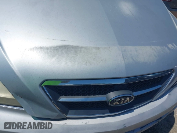 2006 Kia Sorento LX with VIN KNDJD733865509532, listed as a IAAI auction lot 42137155 with 209,149 mi miles and . Bid and sale history available at DreamBid. Image 14.