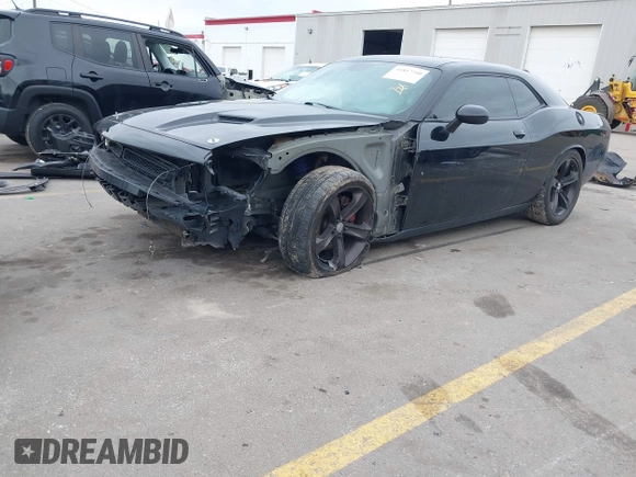 2015 Dodge Challenger R/T with VIN 2C3CDZATXFH712765, listed as a IAAI auction lot 41817210 with 99,535 mi miles and . Bid and sale history available at DreamBid. Image 18.