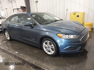 2018 Ford Fusion SE z VIN 3FA6P0LU4JR110044, wystawiony jako IAAI lot #42266022 z przebiegiem 101 942 mil mil oraz . Historia ofert i sprzedaży dostępna na DreamBid. Obrazek 1.
