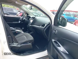 2014 Dodge Journey SXT z VIN 3C4PDCBBXET135001, wystawiony jako IAAI lot #42318360 z przebiegiem 152 321 mil mil oraz . Historia ofert i sprzedaży dostępna na DreamBid. Obrazek 5.