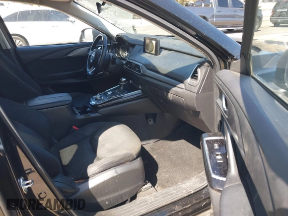 2020 Mazda CX-9 Sport with VIN JM3TCABY8L0407430, listed as a IAAI auction lot 42288490 with 50,317 mi miles and . Bid and sale history available at DreamBid. Image 5.