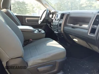 2014 Ram 1500 Tradesman z VIN 3C6JR7DG4EG324833, wystawiony jako IAAI lot #42876061 z przebiegiem 125 285 mil mil oraz . Historia ofert i sprzedaży dostępna na DreamBid. Obrazek 5.