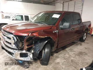 2015 Ford F-150 XLT with VIN 1FTEW1C84FKD05672, listed as a IAAI auction lot 41366154 with 119,504 mi miles and . Bid and sale history available at carsss.com. Image 2.