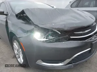 2015 Chrysler 200 Limited with VIN 1C3CCCAB1FN576170, listed as a IAAI auction lot 41893765 with 117,110 mi miles and . Bid and sale history available at DreamBid. Image 6.