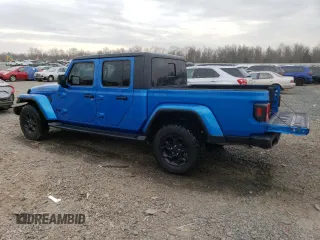 2023 Jeep Gladiator Freedom с VIN 1C6HJTAG3PL579160, выставлен на аукционе Copart как лот 46909635 с пробегом 10 081 миль миль и Списание • Salvage title. История ставок и продаж доступна на DreamBid. Изображение 2.