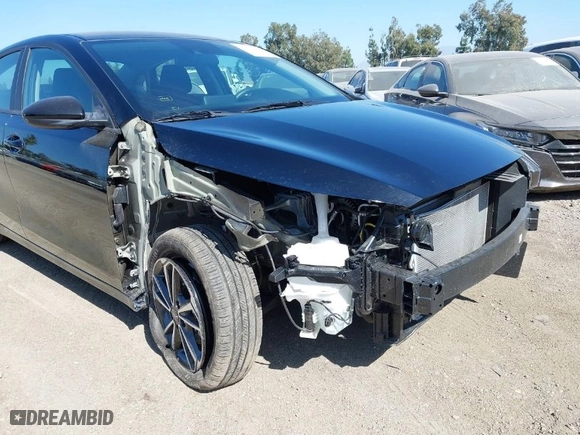 2023 Kia Forte LXS with VIN 3KPF24AD2PE652312, listed as a IAAI auction lot 41620734 with 9,866 mi miles. Bid and sale history available at carsss.com. Image 6.