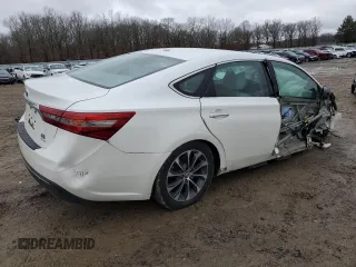 2016 Toyota Avalon XLE Premium z VIN 4T1BD1EB9GU055400, wystawiony jako Copart lot #44985405 z przebiegiem 246 456 mil mil oraz Czysty tytuł • Clean title. Historia ofert i sprzedaży dostępna na DreamBid. Obrazek 3.