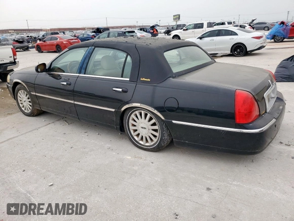 2004 Lincoln Town Car Ultimate z VIN 1LNHM83W14Y660640, wystawiony jako Copart lot #53652685 z przebiegiem 147 781 mil mil oraz Czysty tytuł • Clean title. Historia ofert i sprzedaży dostępna na DreamBid. Obrazek 2.
