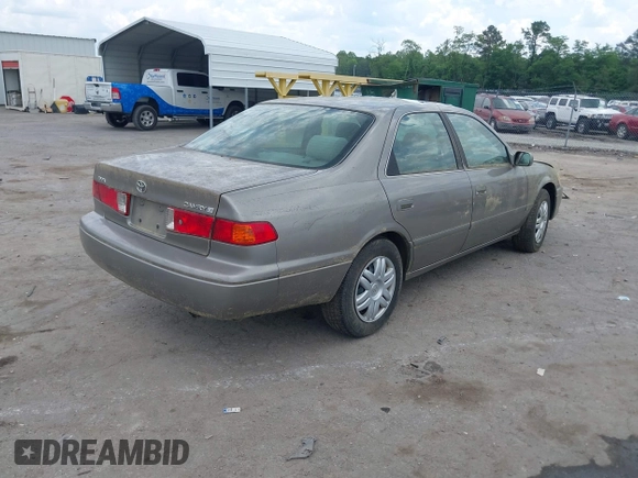 2001 Toyota Camry CE with VIN 4T1BG28K11U040227, listed as a IAAI auction lot 42220307 with 212,125 mi miles and . Bid and sale history available at DreamBid. Image 4.