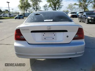2002 Honda Civic DX with VIN 1HGEM22212L020068, listed as a Copart auction lot 50657135 with Not Provided miles and Salvage Title. Bid and sale history available at DreamBid. Image 6.