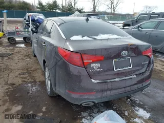 2011 Kia Optima EX with VIN KNAGN4A75B5158176, listed as a IAAI auction lot 41553536 with 140,785 mi miles. Bid and sale history available at carsss.com. Image 3.