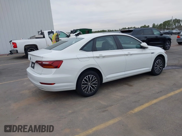 2019 Volkswagen Jetta SEL z VIN 3VWE57BU4KM248989, wystawiony jako IAAI lot #41465186 z przebiegiem 41 985 mil mil oraz . Historia ofert i sprzedaży dostępna na DreamBid. Obrazek 4.