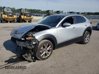 2021 Mazda CX-30 Select with VIN 3MVDMABL5MM308933, listed as a Copart auction lot 55103945 with 65,882 mi miles and Salvage title. Bid and sale history available at DreamBid. Image 1.