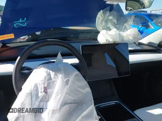 2023 Tesla Model 3 Long Range with VIN 5YJ3E1EB5PF623706, listed as a IAAI auction lot 41321269 with 21,081 mi miles and . Bid and sale history available at DreamBid. Image 18.
