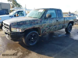 2001 Dodge Ram 1500 with VIN 1B7HC13Y71J290038, listed as a IAAI auction lot 40971921 with 162,943 mi miles. Bid and sale history available at carsss.com. Image 2.
