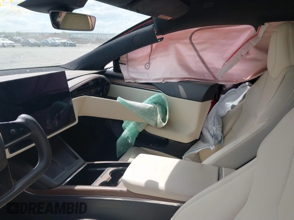 2022 Tesla Model S with VIN 5YJSA1E58NF463643, listed as a IAAI auction lot 41861483 with Not Provided miles and . Bid and sale history available at DreamBid. Image 5.