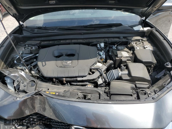 2024 Mazda CX-30 S Carbon Edition with VIN 3MVDMBCM1RM708265, listed as a Copart auction lot 62295055 with 20,404 mi miles and Salvage title. Bid and sale history available at DreamBid. Image 12.