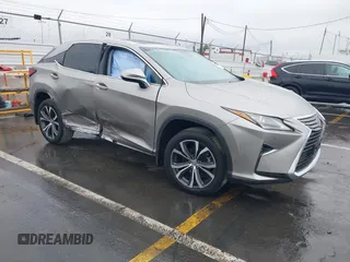 2017 Lexus RX with VIN 2T2ZZMCA8HC066740, listed as a IAAI auction lot 41734449 with 54,673 mi miles. Bid and sale history available at carsss.com. Image 1.