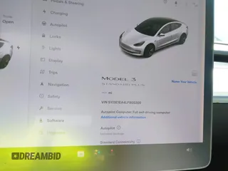 2020 Tesla Model 3 Standard Range Plus with VIN 5YJ3E1EA4LF805205, listed as a IAAI auction lot 41850744 with Not Provided miles. Bid and sale history available at carsss.com. Image 14.