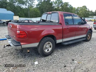2001 Ford F-150 XLT with VIN 1FTRW07LX1KD65474, listed as a Copart auction lot 61474655 with 361,023 mi miles and Salvage title. Bid and sale history available at DreamBid. Image 3.