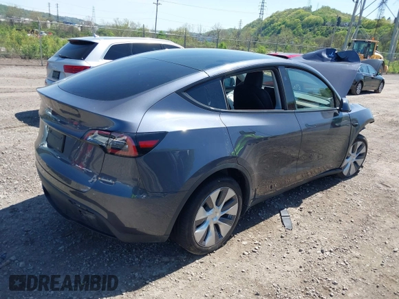 2023 Tesla Model Y Long Range z VIN 7SAYGDEE8PA191415, wystawiony jako IAAI lot #42155577 z przebiegiem 42 149 mil mil oraz . Historia ofert i sprzedaży dostępna na DreamBid. Obrazek 4.