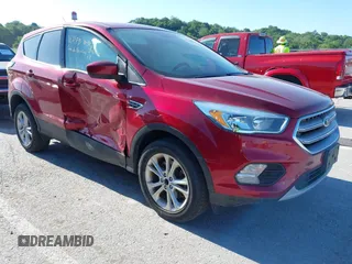 2017 Ford Escape SE z VIN 1FMCU9G9XHUE08239, wystawiony jako IAAI lot #42326698 z przebiegiem 96 471 mil mil oraz . Historia ofert i sprzedaży dostępna na DreamBid. Obrazek 1.
