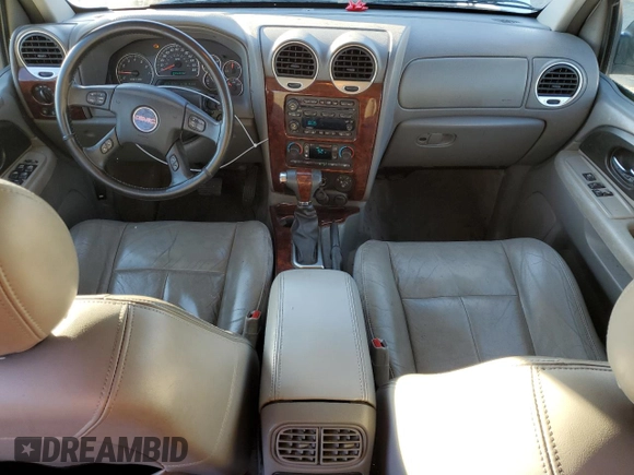 2005 GMC Envoy SLE с VIN 1GKDS13S852261326, выставлен на аукционе Copart как лот 42650025 с пробегом 210 485 миль миль и Списание • Salvage title. История ставок и продаж доступна на DreamBid. Изображение 8.