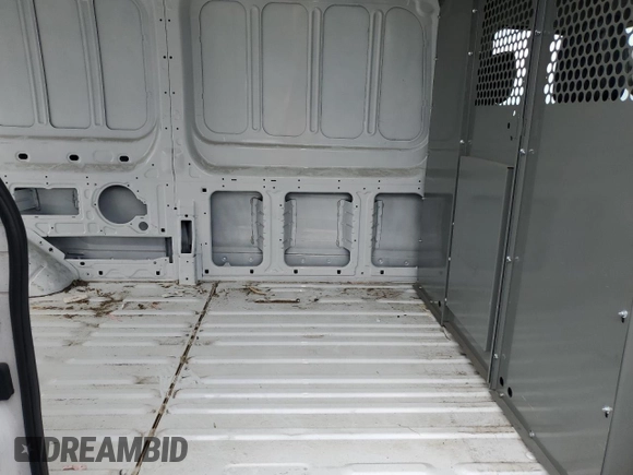 2023 Ford Transit Cargo с VIN 1FTBR1C8XPKB44983, выставлен на аукционе Copart как лот 63350635 с пробегом 73 083 миль миль и Списание • Salvage title. История ставок и продаж доступна на DreamBid. Изображение 11.