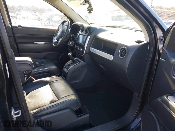 2016 Jeep Compass High Altitude Edition with VIN 1C4NJCEA4GD806612, listed as a IAAI auction lot 41538090 with 104,447 mi miles. Bid and sale history available at carsss.com. Image 5.
